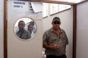Zimbabwean hunter Theo Bronkhorst leaves court in Hwange, October 15, 2015. REUTERS/Philimon Bulawayo